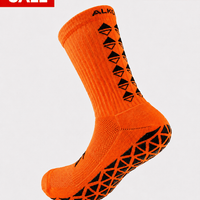 Neon pink grip socks by ALKO-TEK with enhanced durability and performance for athletes