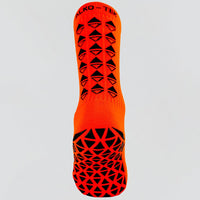 Neon pink grip socks by ALKO-TEK designed for durability and athletic performance