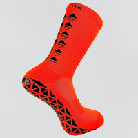 Neon pink grip socks by ALKO-TEK with durable polyamide material for enhanced athletic performance